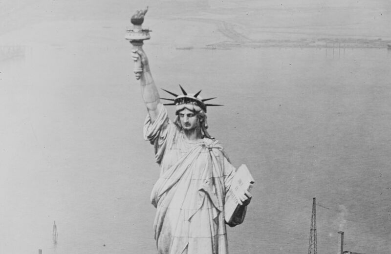 The Statue of Liberty photographed from an Army airplane over New York Harbor, c. 1920